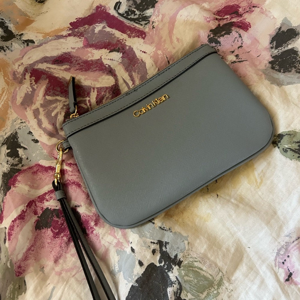 Blue Calvin Klein wristlet